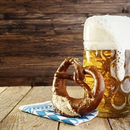 Hyatt Regency Chennai Hotel Exterior photo A pretzel and a mug of beer