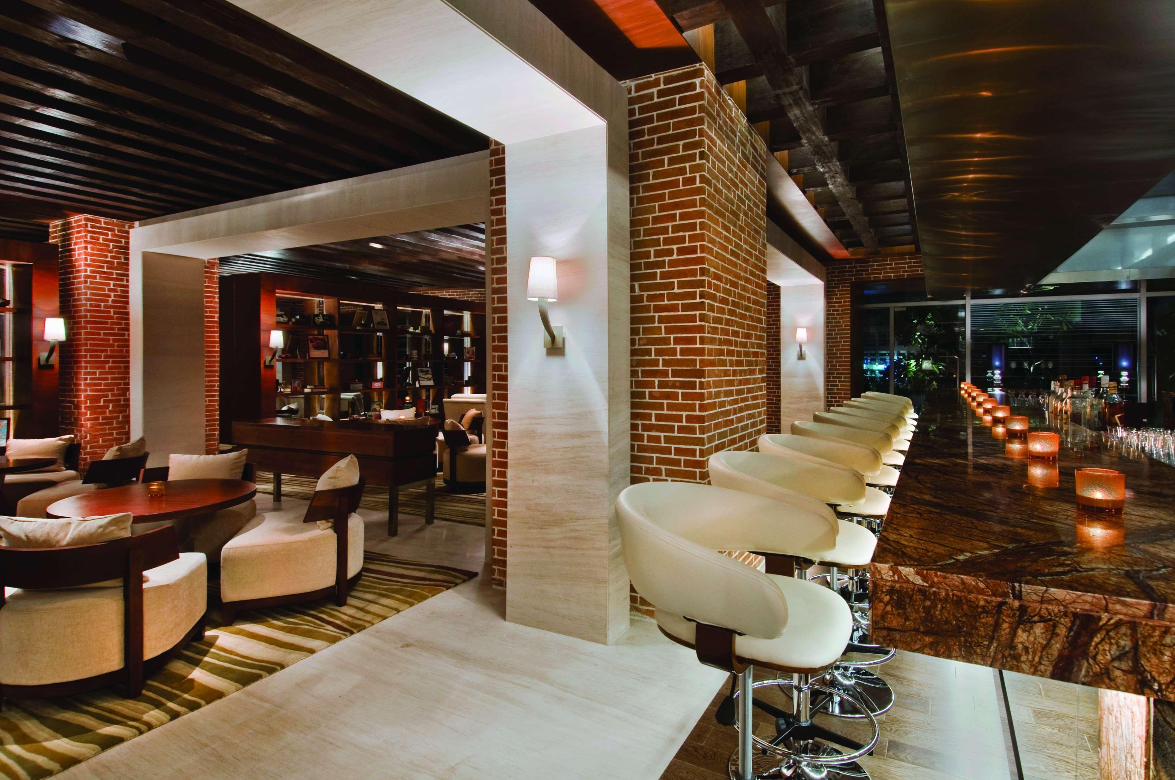 Hyatt Regency Chennai Hotel Exterior photo The bar at the hotel